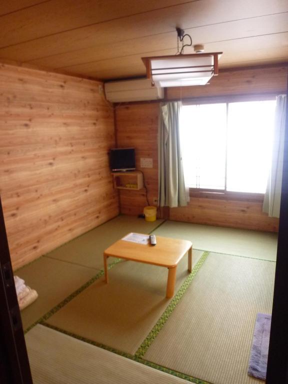 A Pousada Minshuku Kaisei 1 Yakushima  Quarto foto